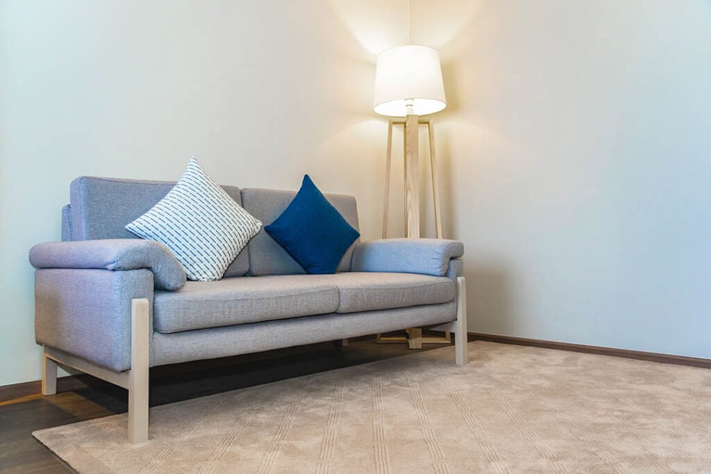 _comfortable-pillow-sofa-decoration-with-light-lamp-interior