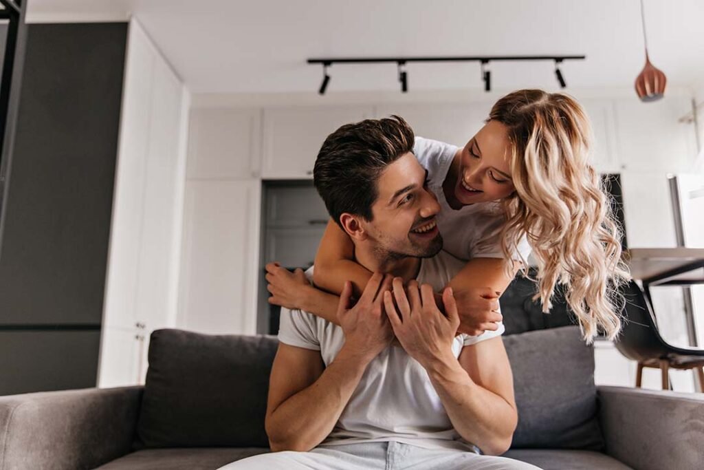 _charming-caucasian-lady-embracing-husband
