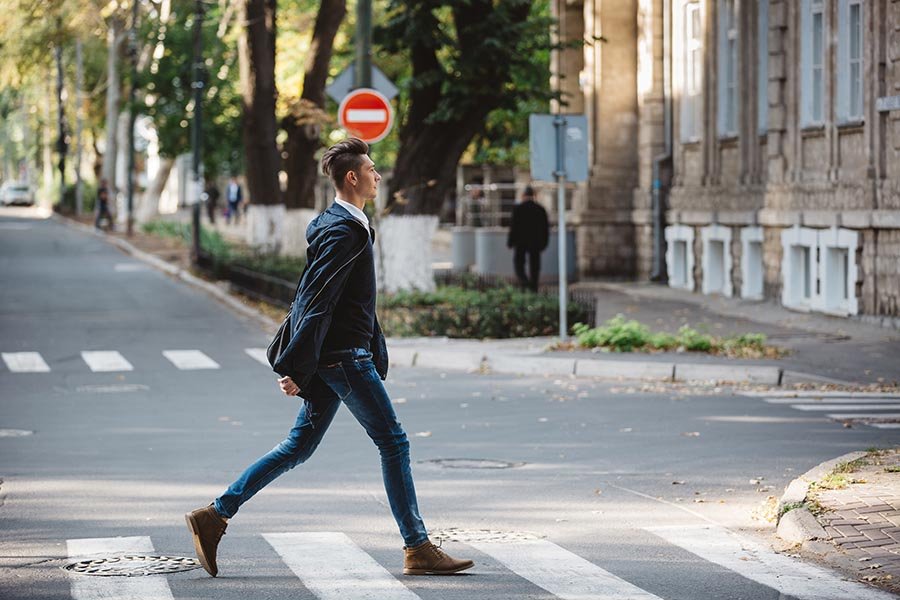 _young-man-cross-street